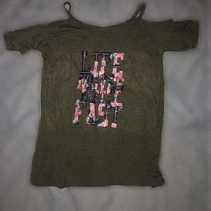 Green “Life Moves Pretty Fast” shirt